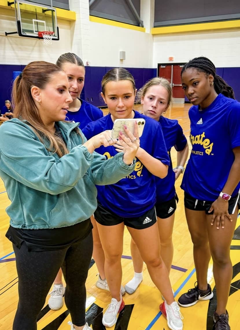 Julie Berardi coaching a dance team