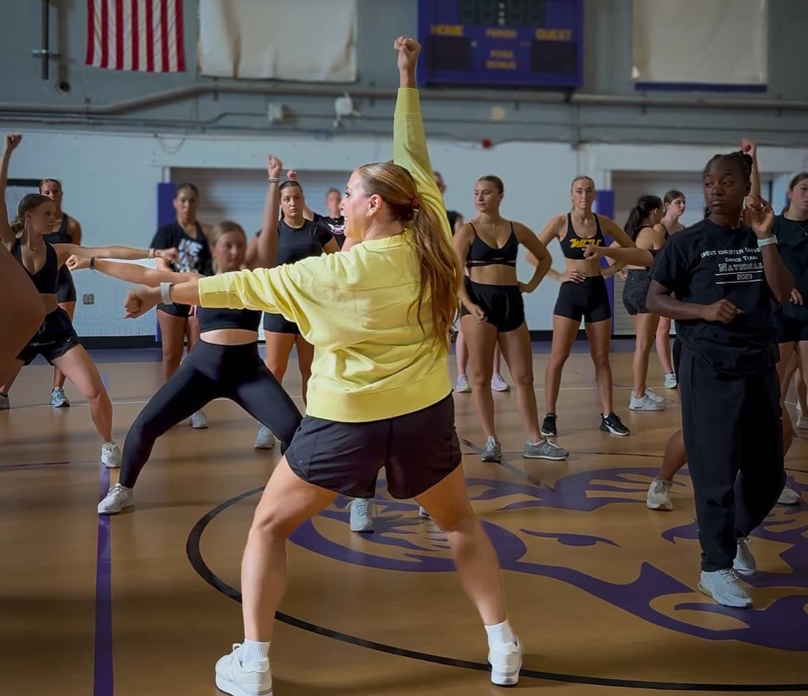Julie Berardi coaching a dance team